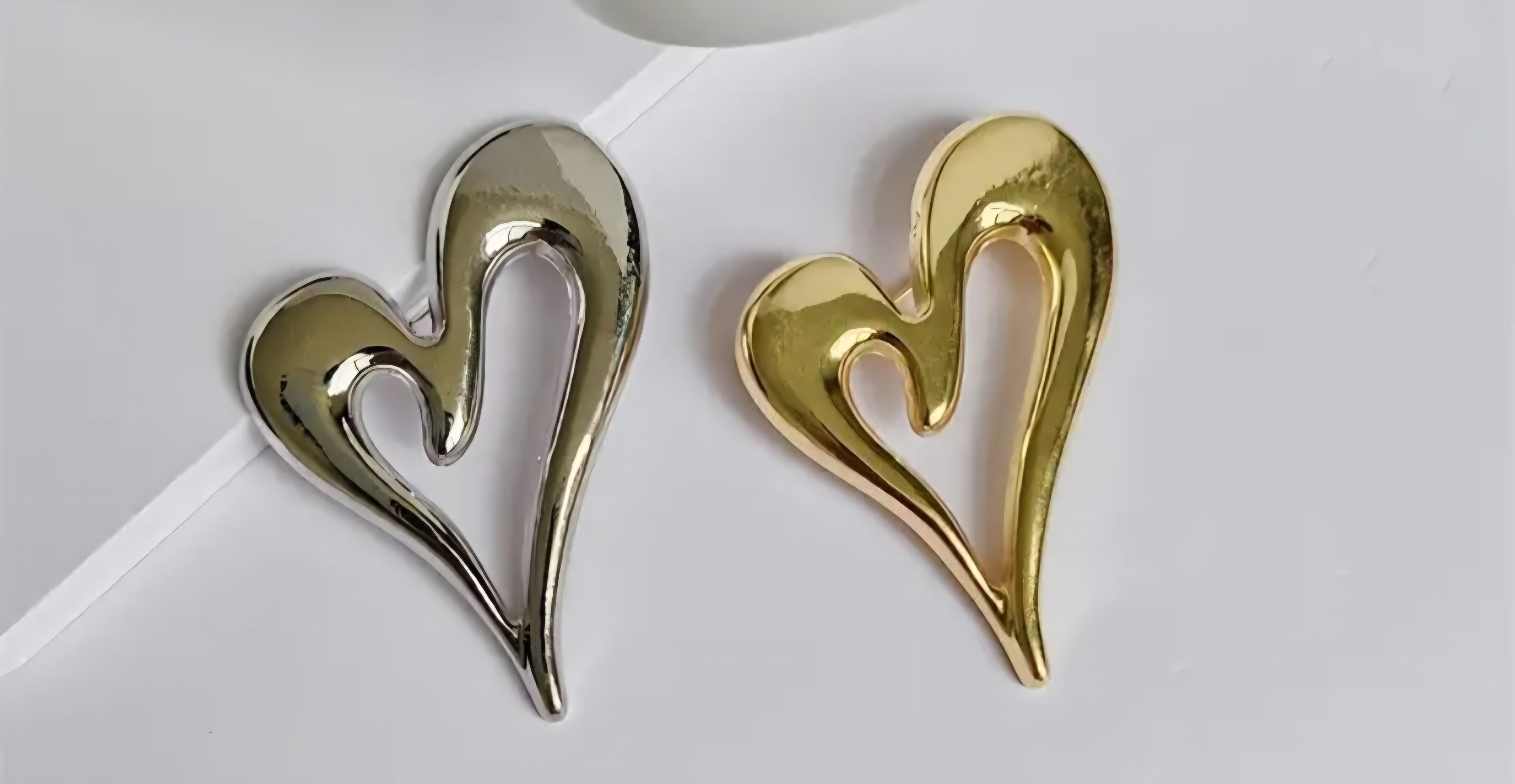 Broche hart - goud en zilver