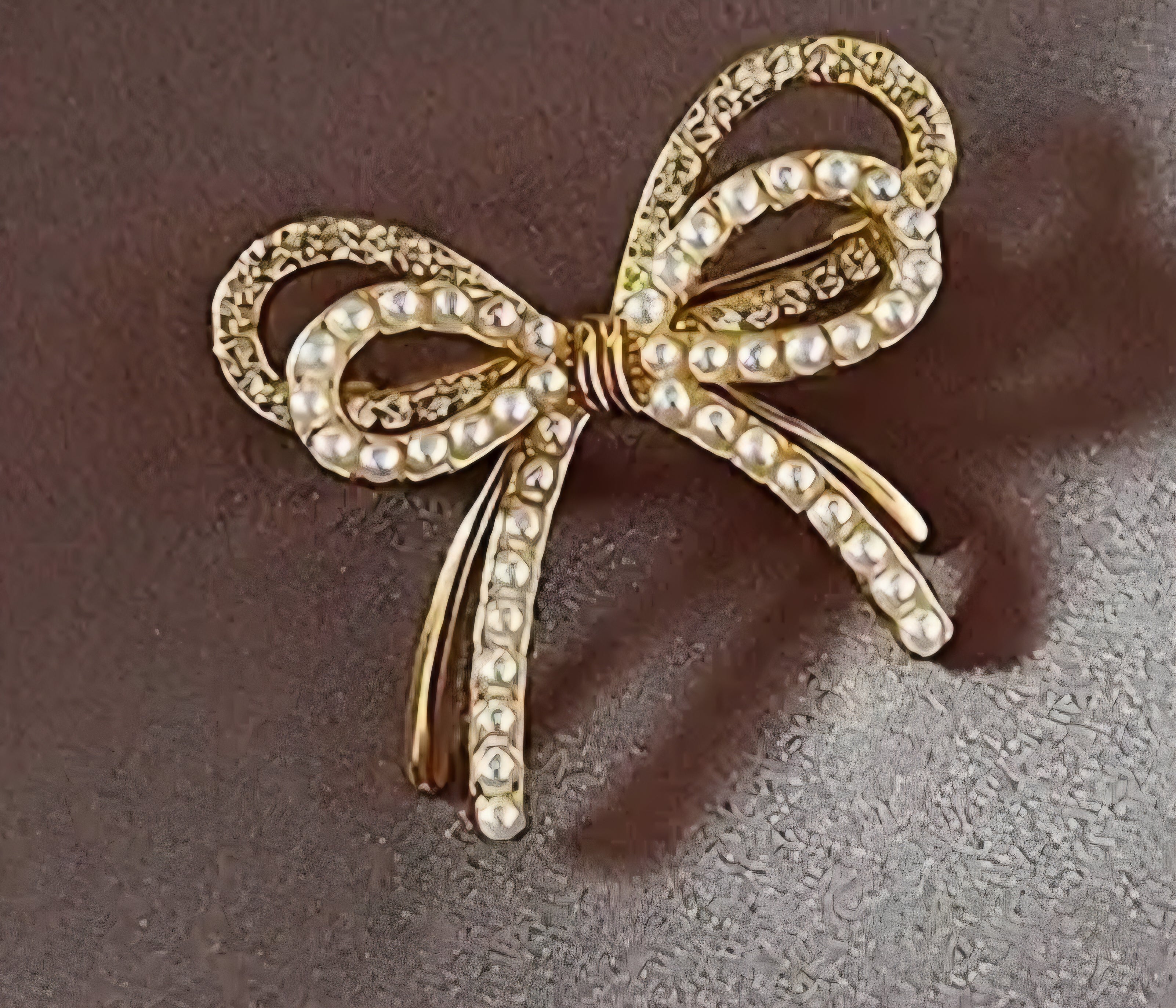 Broche strik- strassteentjes