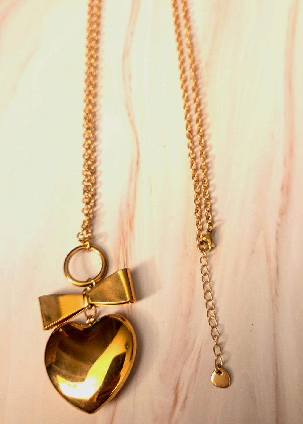 Lange ketting - 80cm - goud- met hart en strik- Stainlesssteel